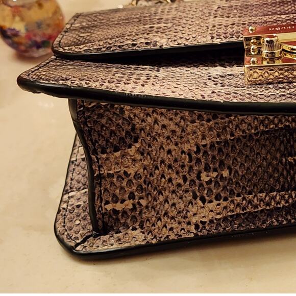 Henri Bendel Waldorf Party Bag Python
Convertible Gold Chain - Picture 9 of 10